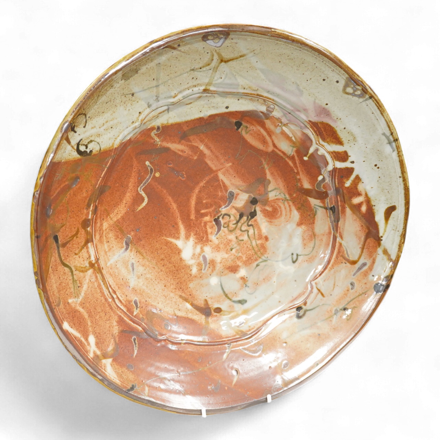 John Parker Glick (1938-2017), Plum Tree Pottery, a glazed charger, signed and stamped to the base, 43cm in diameter